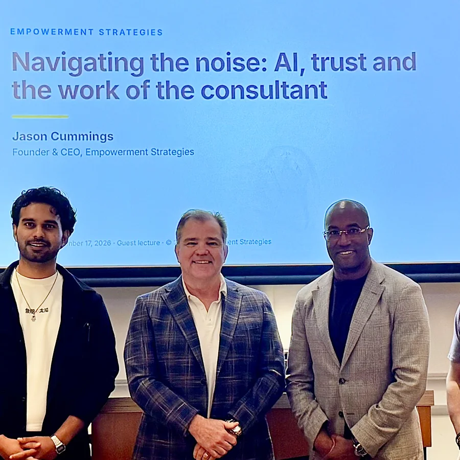 Jason Cummings with the Managerial Consultancy class at Case Western Reserve University, title slide behind them
